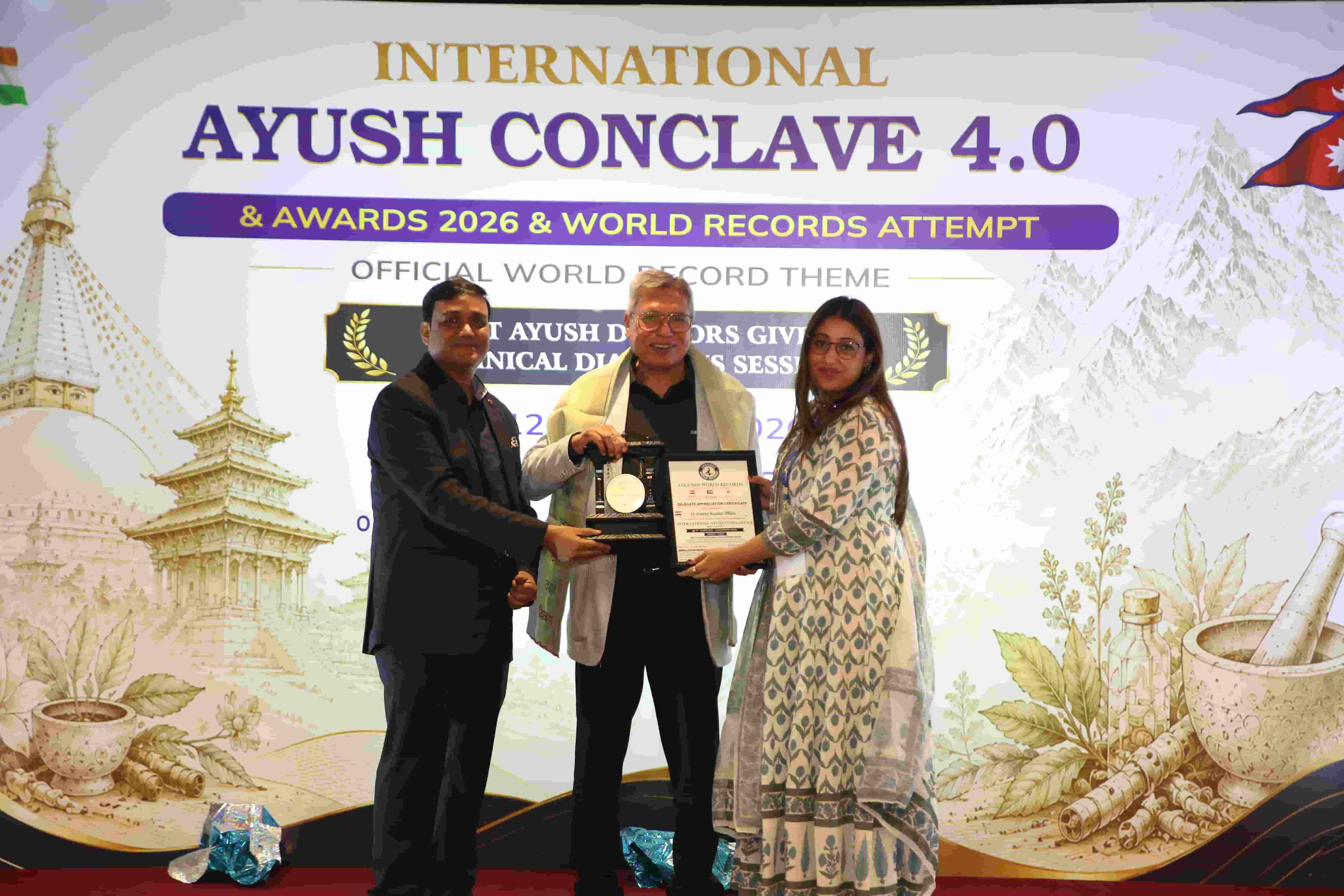 Dr. Arveena Kaushal receiving the AYUSH Legendary Award at AYUSH Conclave 4.0, Nepal